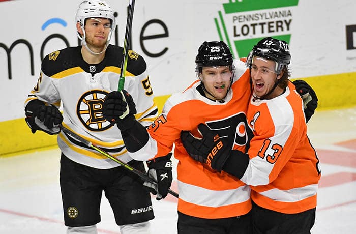 Philadelphia Flyers left wing James van Riemsdyk (25) celebrates his goal with Philadelphia Flyers center Kevin Hayes (13) against the Boston Bruins at Wells Fargo Center.