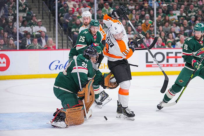 Philadelphia Flyers right wing Travis Konecny (11) tips the puck against the Minnesota Wild goaltender Marc-Andre Fleury (29) in the first period at Xcel Energy Center.