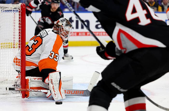 Philadelphia Flyers goaltender Samuel Ersson (33) makes a save during the second period against the Buffalo Sabres at KeyBank Center.