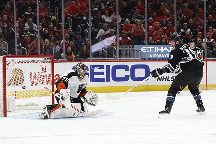 Philadelphia Flyers goaltender Carter Hart (79) makes a save on Washington Capitals right wing Anthony Mantha (39) in the first period at Capital One Arena.