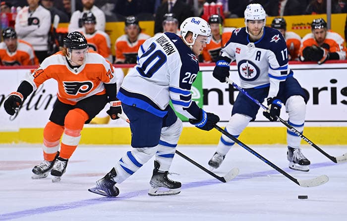 Winnipeg Jets center Karson Kuhlman (20) controls the puck against the Philadelphia Flyers in the first period at Wells Fargo Center. 