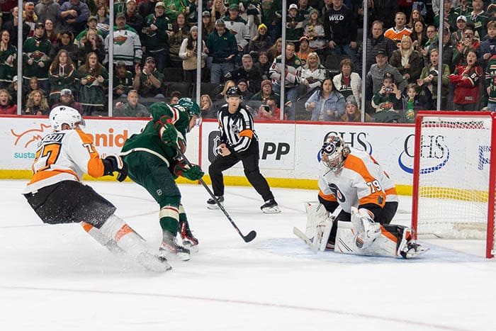 Minnesota Wild right wing Mats Zuccarello (36) scores the game winning goal against Philadelphia Flyers goaltender Carter Hart (79) in overtime at Xcel Energy Center.
