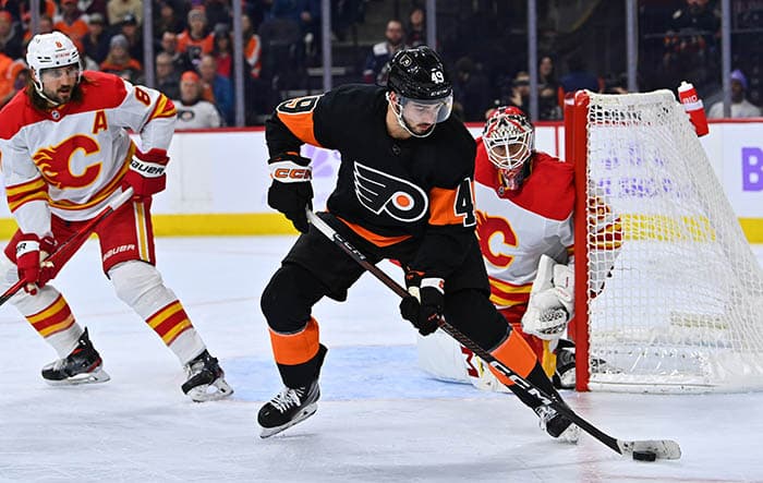 Philadelphia Flyers left wing Noah Cates (49) controls the puck in front of the net against the Calgary Flames in the first period at Wells Fargo Center.