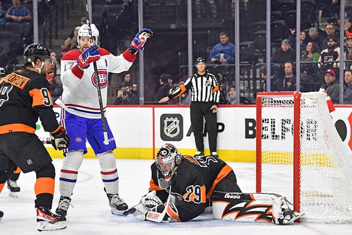 Montreal Canadiens right wing Josh Anderson (17) celebrates a goal by center Nick Suzuki (14) (not pictured) against Philadelphia Flyers goaltender Carter Hart (79) during the second period at Wells Fargo Center.