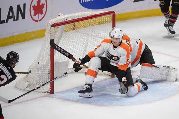 Ottawa Senators right wing Alex DeBrincat (12) scores against Philadelphia Flyers goalie Felix Sandstrom (32) in a shootout at the Canadian Tire Centre. 