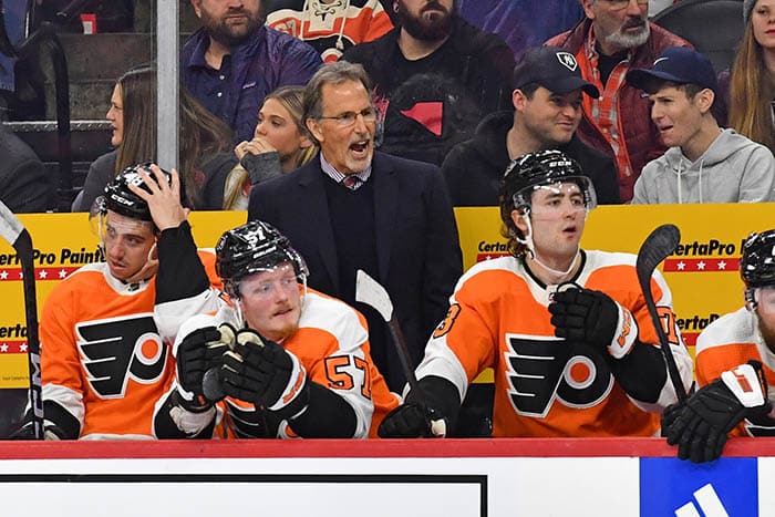 Philadelphia Flyers head coach John Tortorella behind the bench against the New York Rangers during the first period at Wells Fargo Center.