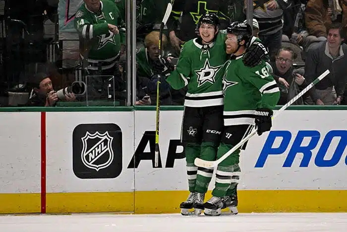 Dallas Stars left wing Jason Robertson (21) and center Joe Pavelski (16) celebrate after Robertson scores a power play goal against the Philadelphia Flyers during the first period at the American Airlines Center. 