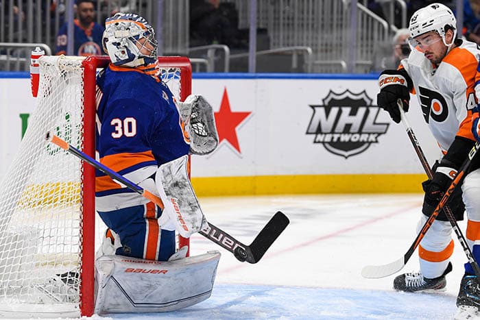 New York Islanders goaltender Ilya Sorokin (30) makes a save against the Philadelphia Flyers during the first period at UBS Arena.