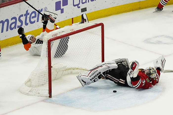 Philadelphia Flyers defenseman Ivan Provorov (9) celebrates after scoring a goal on Chicago Blackhawks goaltender Alex Stalock (32) during overtime at United Center.