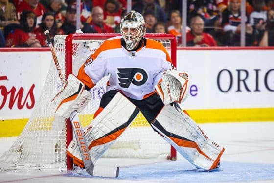 Philadelphia Flyers goaltender Samuel Ersson (33) guards his net against the Calgary Flames during the second period at Scotiabank Saddledome.