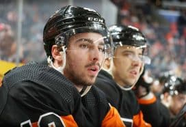 Noah Cates #49 of the Philadelphia Flyers watches the play on the ice during the first period against the Vancouver Canucks at the Wells Fargo Center on October 15, 2022 in Philadelphia, Pennsylvania.