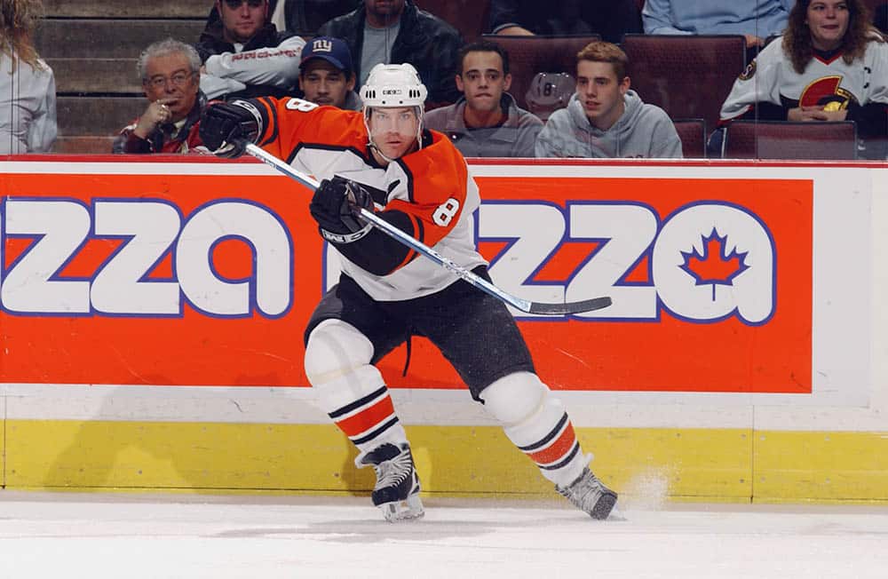 Mark Recchi #8 of the Philadelphia Flyers skates during the NHL game against the Ottawa Senators at the Corel Center on December 23, 2002 in Ottawa, Canada. The game ended in a 2-2 tie.
