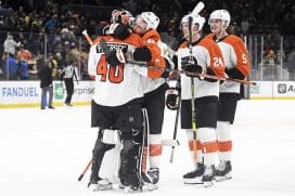 Philadelphia Flyers left wing Nicolas Deslauriers (44) hugs goaltender Cal Petersen (40) after defeating the Boston Bruins in a shoot out at TD Garden.