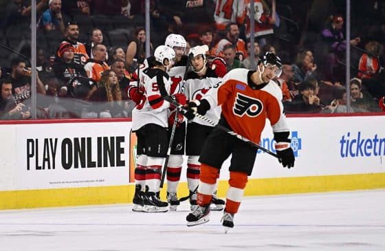 New Jersey Devils center Erik Haula (56) celebrates with teammates after scoring a goal against the Philadelphia Flyers in overtime at Wells Fargo Center.