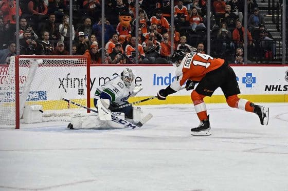 Philadelphia Flyers center Sean Couturier (14) scores on Vancouver Canucks goaltender Thatcher Demko (35) on a penalty shot in the first period at the Wells Fargo Center.