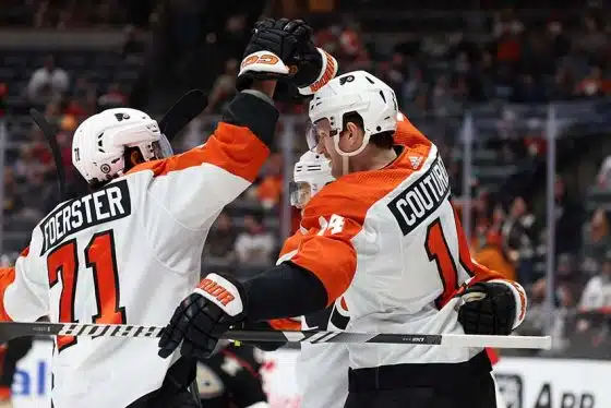 Philadelphia Flyers center Sean Couturier (14) celebrates with right wing Tyson Foerster (71) after scoring a goal during the first period against the Anaheim Ducks at Honda Center.