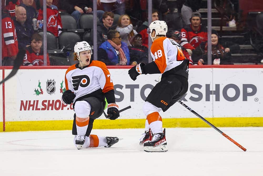 Philadelphia Flyers right wing Owen Tippett (74) celebrates his game-winning goal against the New Jersey Devils during overtime at Prudential Center.