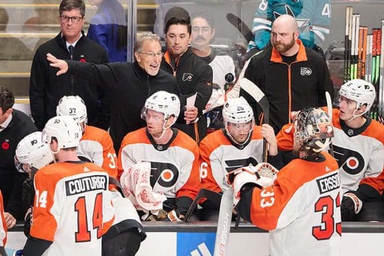 Philadelphia Flyers head coach John Tortorella instructs goaltender Samuel Ersson (33) during the third period against the San Jose Sharks at SAP Center at San Jose.