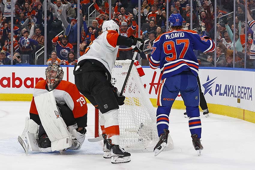 Edmonton Oilers forward Connor McDavid (97) celebrates after scoring a goal against the Philadelphia Flyers goaltender Carter Hart (79) during the first period at Rogers Place.