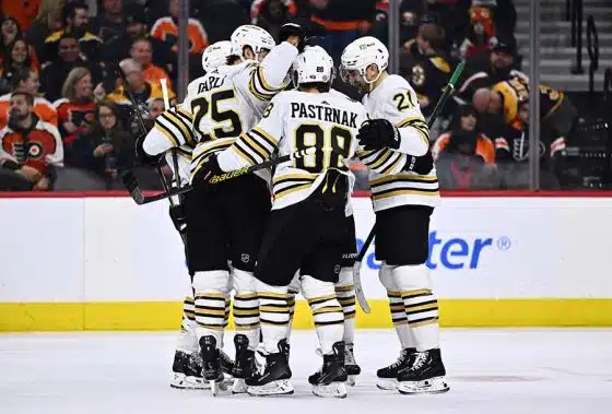 Boston Bruins right wing David Pastrnak (88) celebrates with teammates after scoring a goal against the Philadelphia Flyers in the first period at Wells Fargo Center.