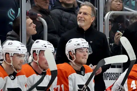 Head coach John Tortorella of the Philadelphia Flyers coaches in his 1,500th NHL game against the Seattle Kraken during the third period at Climate Pledge Arena on December 29, 2023 in Seattle, Washington. John Tortorella becomes the eighth all-time, third active and first U.S.-born head coach to reach 1,500 games in NHL history.