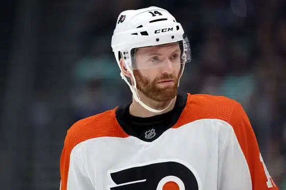 Sean Couturier #14 of the Philadelphia Flyers looks on against the Seattle Kraken at Climate Pledge Arena on December 29, 2023 in Seattle, Washington.