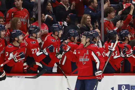 Washington Capitals defenseman John Carlson (74) celebrates with teammates after scoring a goal against the Philadelphia Flyers in the second period at Capital One Arena.