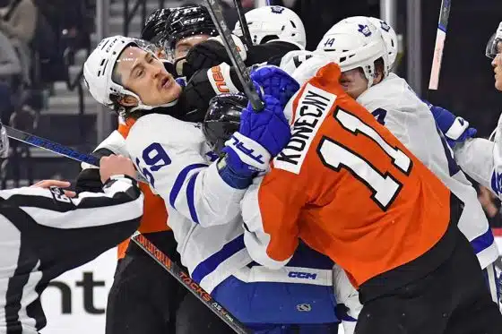 Toronto Maple Leafs left wing Tyler Bertuzzi (59) and Philadelphia Flyers right wing Travis Konecny (11) battle during the third period at Wells Fargo Center.