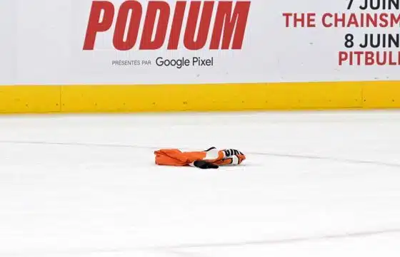 A fan’s Philadelphia Flyers jersey on the ice after the Montreal Canadiens eight goal of the game during the third period at the Bell Centre.
