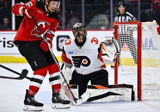 Philadelphia Flyers goalie Samuel Ersson (33) defends the net against New Jersey Devils left wing Erik Haula (56) in the second period at Wells Fargo Center.