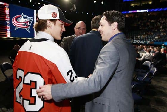 NASHVILLE, TENNESSEE - JUNE 29: Denver Barkey talks with general manager Daniel Briere of the Philadelphia Flyers after being selected 95th overall during the 2023 Upper Deck NHL Draft - Rounds 2-7 at Bridgestone Arena on June 29, 2023 in Nashville, Tennessee.