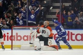 Jan 5, 2025; Toronto, Ontario, CAN; Toronto Maple Leafs defenceman Morgan Rielly (44) celebrates after scoring the game winning goal against Philadelphia Flyers goaltender Ivan Fedotov (82) during overtime at Scotiabank Arena.