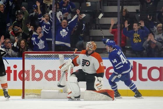 Jan 5, 2025; Toronto, Ontario, CAN; Toronto Maple Leafs defenceman Morgan Rielly (44) celebrates after scoring the game winning goal against Philadelphia Flyers goaltender Ivan Fedotov (82) during overtime at Scotiabank Arena.