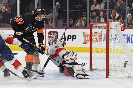 Jan 13, 2025; Philadelphia, Pennsylvania, USA; Philadelphia Flyers left wing Noah Cates (27) scores a goal past Florida Panthers center Eetu Luostarinen (27) during the third period at Wells Fargo Center.