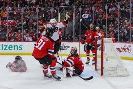Jan 18, 2025; Newark, New Jersey, USA; Philadelphia Flyers right wing Bobby Brink (10) scores a goal on New Jersey Devils goaltender Jake Allen (34) during the third period at Prudential Center.
