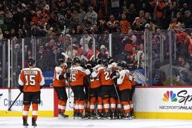 Jan 21, 2025; Philadelphia, Pennsylvania, USA; Philadelphia Flyers celebrate win against the Detroit Red Wings in overtime at Wells Fargo Center.