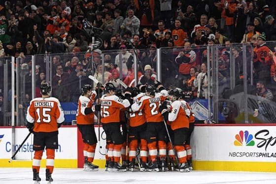 Jan 21, 2025; Philadelphia, Pennsylvania, USA; Philadelphia Flyers celebrate win against the Detroit Red Wings in overtime at Wells Fargo Center.