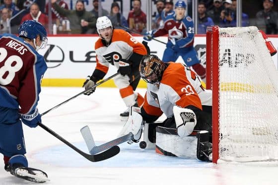 DENVER, COLORADO - FEBRUARY 02: Samuel Ersson #33 of the Philadelphia Flyers makes a save against Martin Necas #88 of the Colorado Avalanche in the second period at Ball Arena on February 02, 2025 in Denver, Colorado.