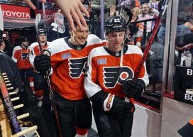 PHILADELPHIA, PENNSYLVANIA - FEBRUARY 22: Andrei Kuzmenko #96 and Jakob Pelletier #22 of the Philadelphia Flyers enter the ice surface for warmups prior to their game against the Edmonton Oilers at the Wells Fargo Center on February 22, 2025 in Philadelphia, Pennsylvania.