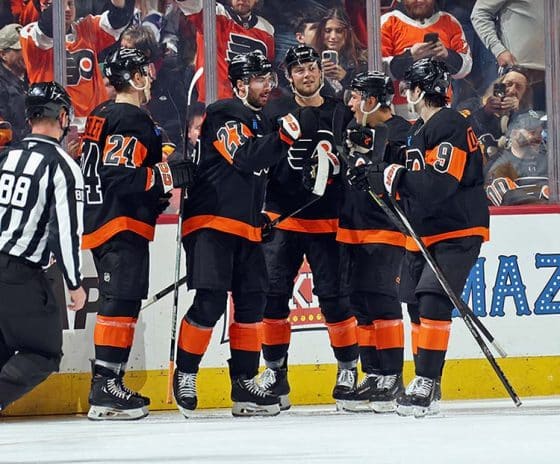 PHILADELPHIA, PENNSYLVANIA - FEBRUARY 25: Noah Cates #27 of the Philadelphia Flyers celebrates his second period goal against the Pittsburgh Penguins with Nick Seeler #24, Tyson Foerster #71, Bobby Brink #10, and Jamie Drysdale #9 at the Wells Fargo Center on February 25, 2025 in Philadelphia, Pennsylvania.