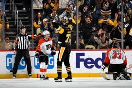 PITTSBURGH, PA - FEBRUARY 27: Evgeni Malkin #71 of the Pittsburgh Penguins celebrates his game winning overtime goal against the Philadelphia Flyers at PPG PAINTS Arena on February 27, 2025 in Pittsburgh, Pennsylvania.