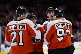 PHILADELPHIA, PENNSYLVANIA - FEBRUARY 22: Andrei Kuzmenko #96 of the Philadelphia Flyers celebrates with Scott Laughton #21, Matvei Michkov #39, and Rasmus Ristolainen #55 after scoring a goal during the second period of the game against the Edmonton Oilers at the Wells Fargo Center on February 22, 2025 in Philadelphia, Pennsylvania.