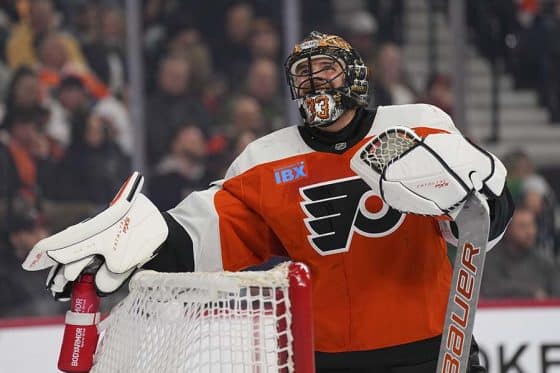 PHILADELPHIA, PENNSYLVANIA - MARCH 4: Samuel Ersson #33 of the Philadelphia Flyers looks on against the Calgary Flames in the first period at the Wells Fargo Center on March 4, 2025 in Philadelphia, Pennsylvania.