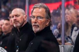 WINNIPEG, CANADA - MARCH 1: Head Coach John Tortorella of the Philadelphia Flyers looks on from the bench during first period action against the Winnipeg Jets at the Canada Life Centre on March 1, 2025 in Winnipeg, Manitoba, Canada. The Flyers defeated the Jets 2-1 in a shootout.