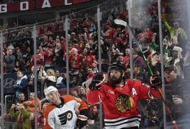 CHICAGO, ILLINOIS - MARCH 23: Patrick Maroon #77 of the Chicago Blackhawks reacts after scoring against the Philadelphia Flyers in the first period at the United Center on March 23, 2025 in Chicago, Illinois.