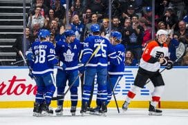 TORONTO, ON - MARCH 25: John Tavares #91 of the Toronto Maple Leafs celebrate3s scoring a goal against the Philadelphia Flyers with his teammates during the first period at the Scotiabank Arena on March 25, 2025 in Toronto, Ontario, Canada.