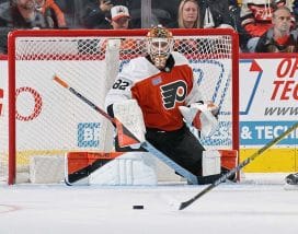PHILADELPHIA, PENNSYLVANIA - MARCH 31: Ivan Fedotov #82 of the Philadelphia Flyers tracks the loose puck during the third period of his game against the Nashville Predators at the Wells Fargo Center on March 31, 2025 in Philadelphia, Pennsylvania.