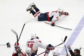 ELMONT, NEW YORK - APRIL 06: Alex Ovechkin #8 of the Washington Capitals celebrates after scoring his 895th career goal during the second period against the New York Islanders to become the NHL all-time goals leader at UBS Arena on April 06, 2025 in Elmont, New York.