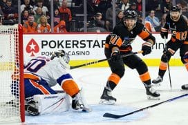 PHILADELPHIA, PENNSYLVANIA - APRIL 12: Tyson Foerster #71 of the Philadelphia Flyers scores a goal against Marcus Hogberg #50 of the New York Islanders during the second period of the game at the Wells Fargo Center on April 12, 2025 in Philadelphia, Pennsylvania.