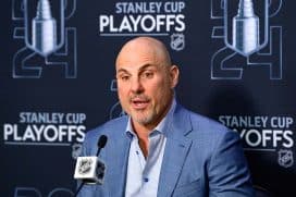VANCOUVER, CANADA - MAY 20: Vancouver Canucks head coach Rick Tocchet speaks to the press after losing to the Edmonton Oilers in Game Seven of the Second Round of the 2024 Stanley Cup Playoffs at Rogers Arena on May 20, 2024 in Vancouver, British Columbia, Canada.